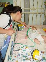 Max in his cot on Parrot Ward