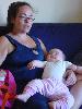 Maz and Maddy asleep in her arms