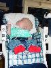 Max asleep in his highchair