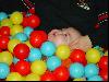 Max in the ball pit (close up)