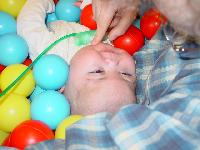J & Max in ball pit