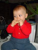 Luca gumming a rusk