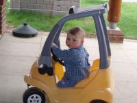 Luca in the toy car